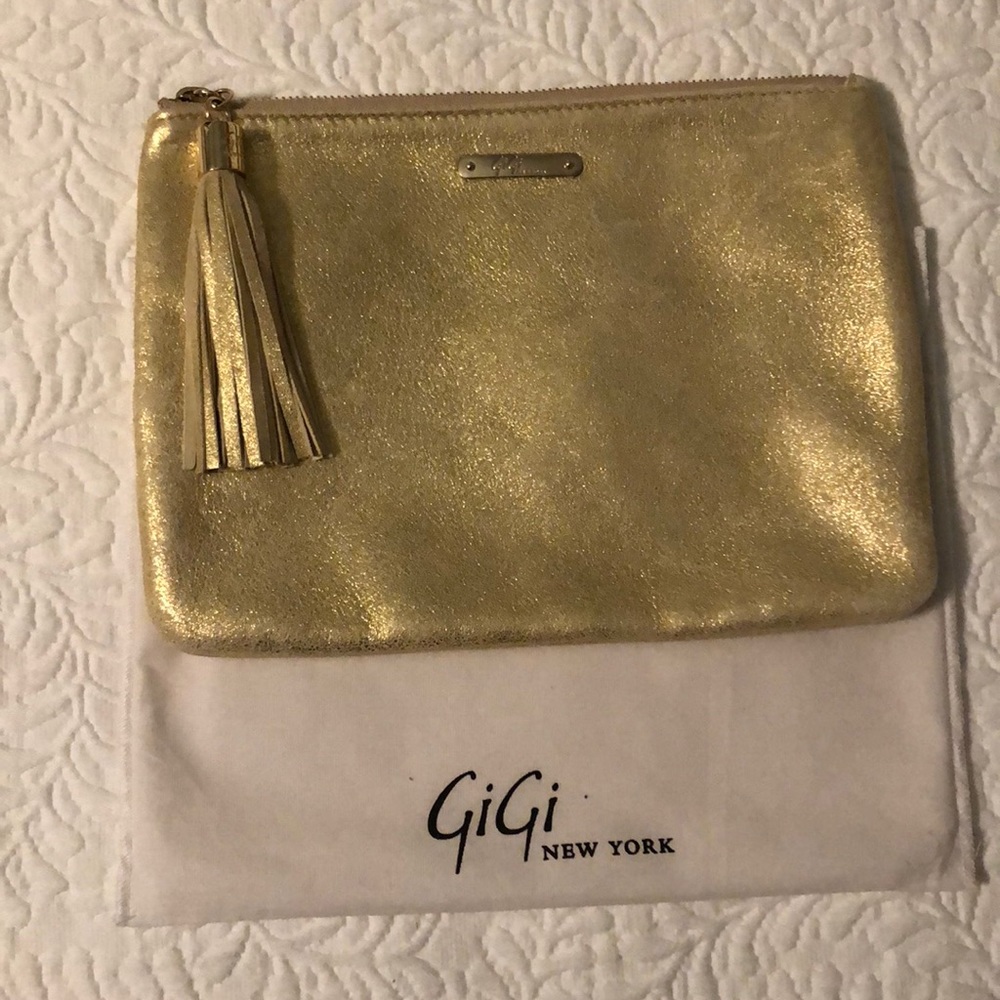 GiGi New York gold clutch with tassel